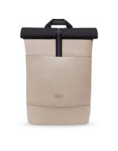Ucon Acrobatics Hajo Medium Backpack Aloe Sand - Black is an everyday bag with separate laptop compartment that has a durable a bit structured matte finish
